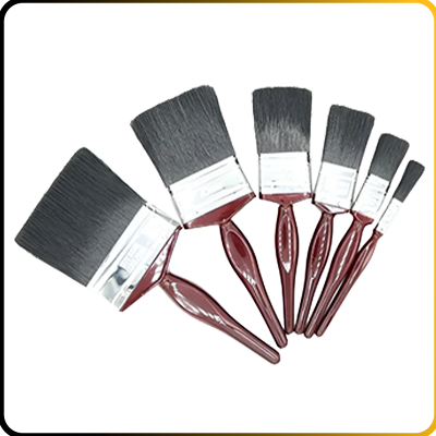 different sized commercial paint brushes on a white background