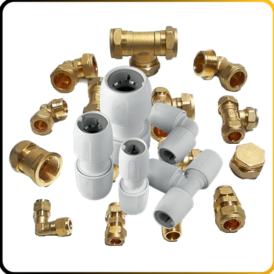 PVC and Copper pipe fittings on a white background