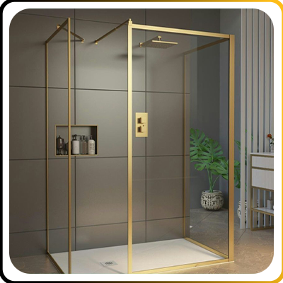 Contemporary hotel shower enclosure with gold trim